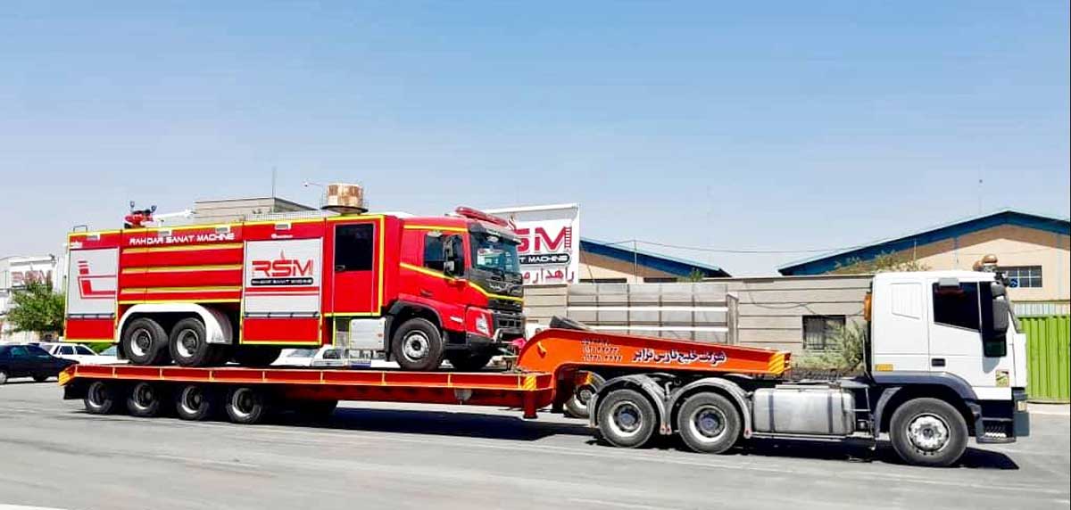 a179 image حمل کامیون آتش نشانی به وسیله کامیون و تریلر کمرشکن